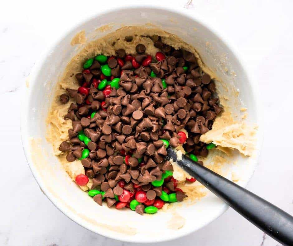 I love the tradition of baking during the holiday season, and these Christmas M&M cookies are always a hit on any cookie platter! Whether you're whipping up a batch for a festive cookie exchange or looking for easy Christmas cookies to enjoy with loved ones, this recipe delivers. These homemade Christmas cookies are not only delicious but also incredibly simple to make, so you have more time to celebrate the Christmas season and spread holiday cheer.