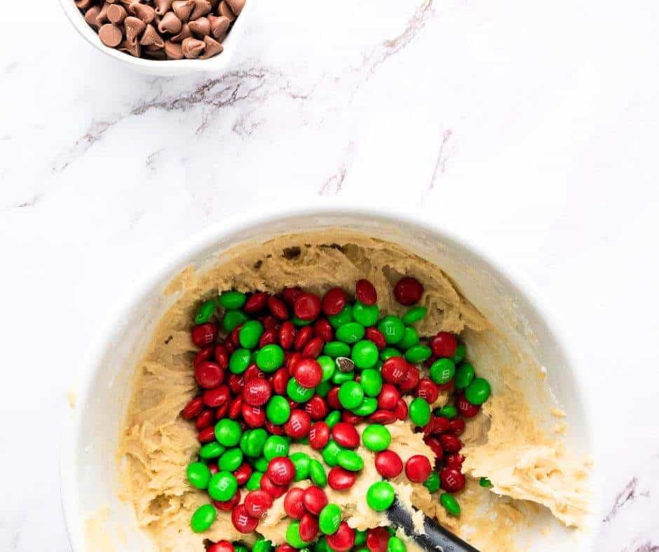 I love the tradition of baking during the holiday season, and these Christmas M&M cookies are always a hit on any cookie platter! Whether you're whipping up a batch for a festive cookie exchange or looking for easy Christmas cookies to enjoy with loved ones, this recipe delivers. These homemade Christmas cookies are not only delicious but also incredibly simple to make, so you have more time to celebrate the Christmas season and spread holiday cheer.