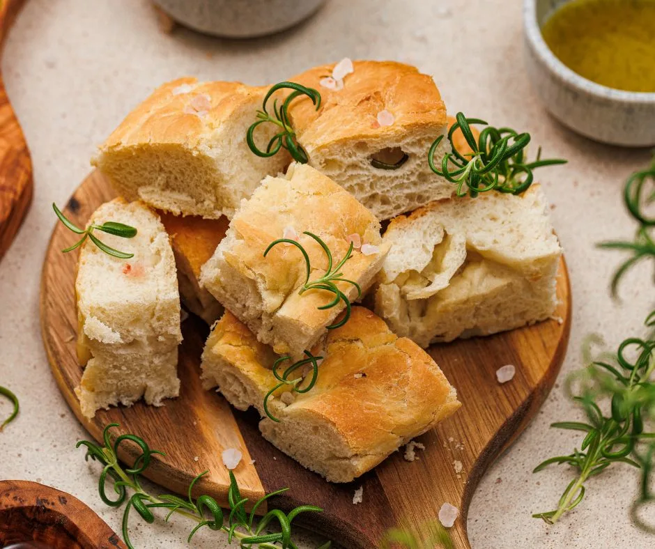 This easy rosemary focaccia bread recipe is beginner-friendly and requires no kneading! With a crispy golden crust, a soft, airy center, and a delicious infusion of olive oil and rosemary, this homemade bread is perfect for dipping, sandwiches, or enjoying on its own.